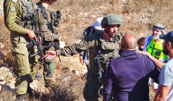 Under Army Protection, Settlers Assault ...